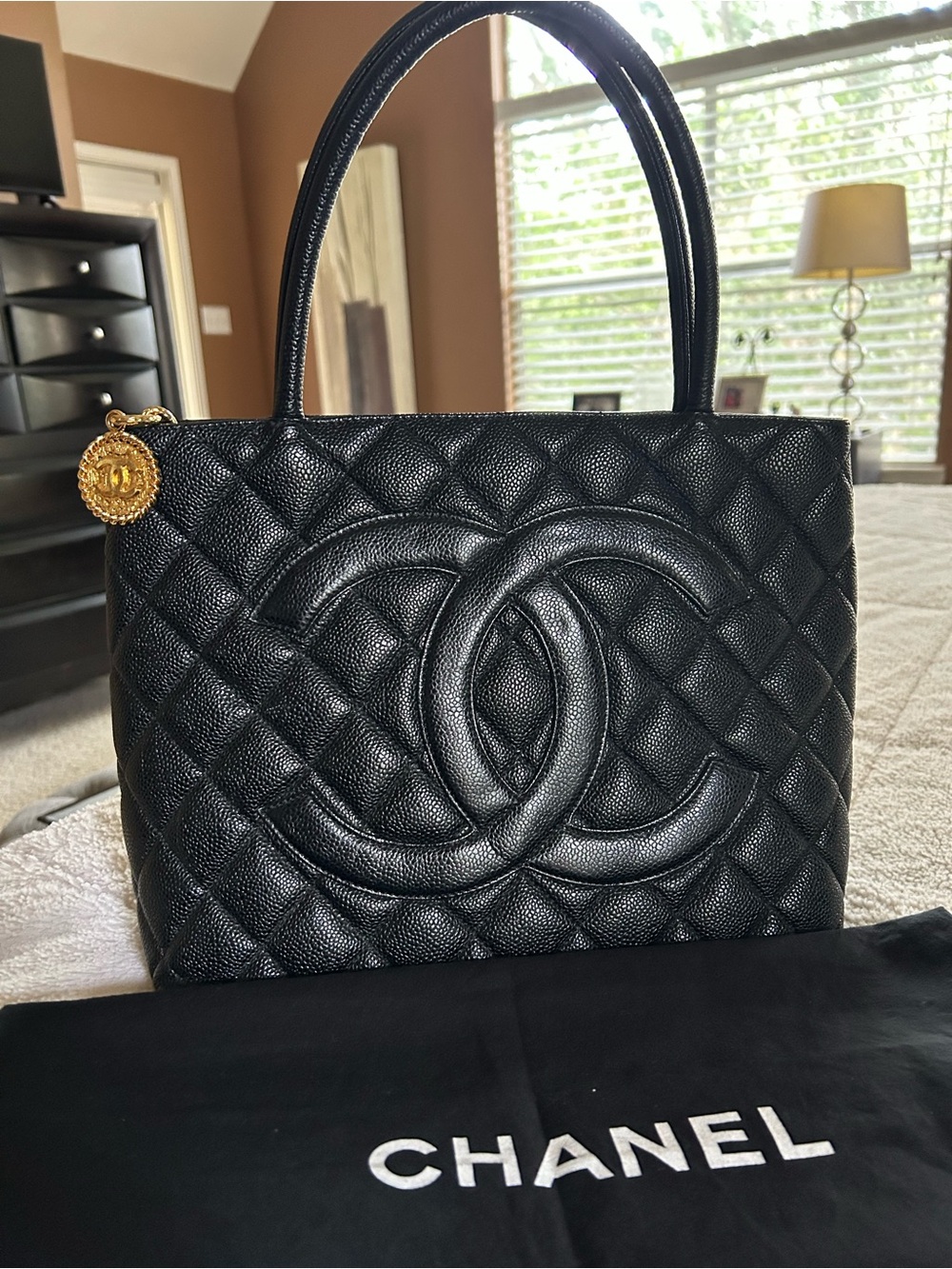 CHANEL Black Quilted Caviar Leather Tote with Gold CC Medallion